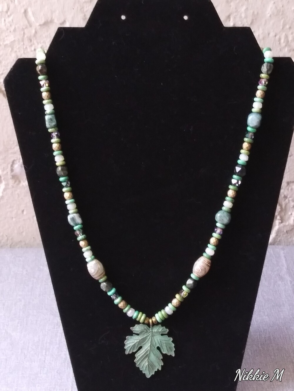 Handmade Green Beaded Necklace with Patina Leaf Pendant